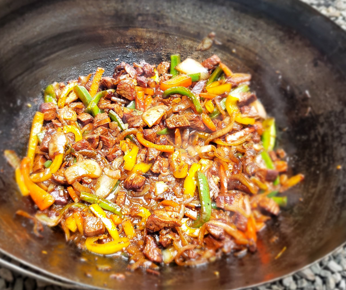 Sajieh in Jordan or improvised stir-fry in the backyard of a café