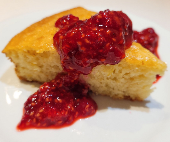 Lemon cake, sweetened with maple, gluten-free, dairy-free, with crushed raspberries in Normand